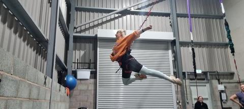 Flying with bungee cord fitness classes.